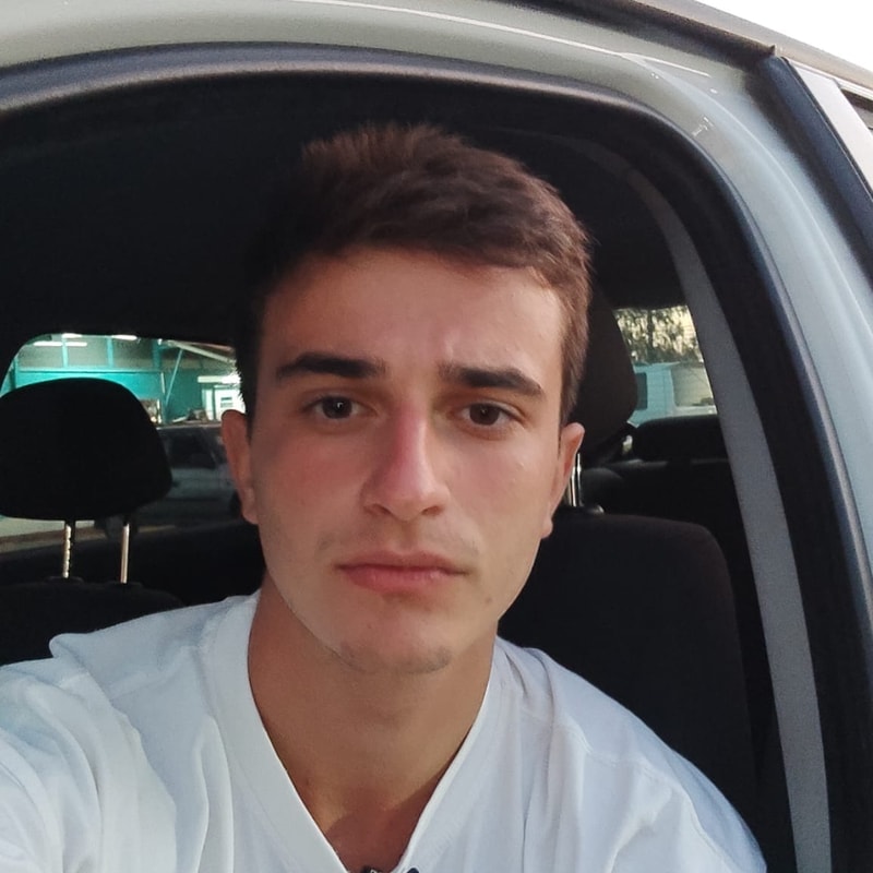 AT